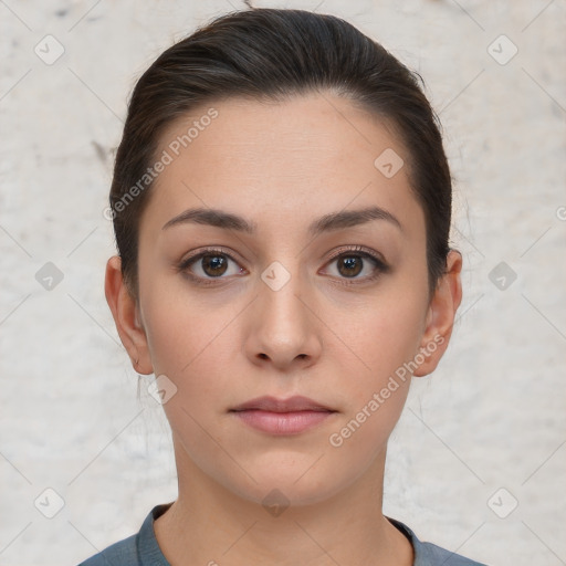 Neutral white young-adult female with short  brown hair and brown eyes