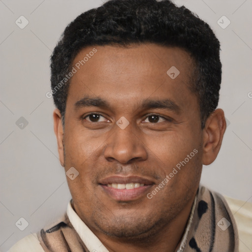 Joyful latino young-adult male with short  brown hair and brown eyes