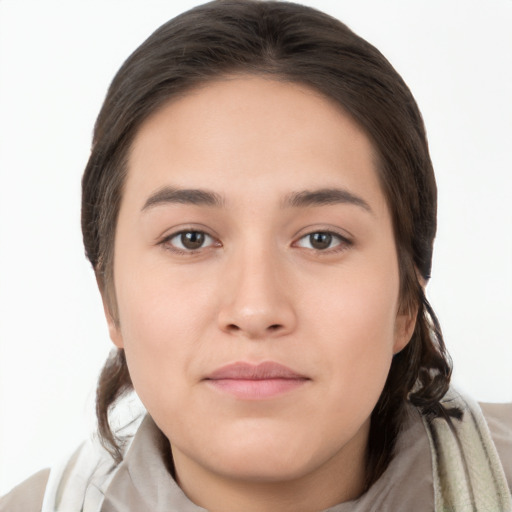 Neutral white young-adult female with long  brown hair and brown eyes