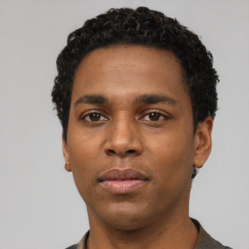 Neutral black young-adult male with short  black hair and brown eyes