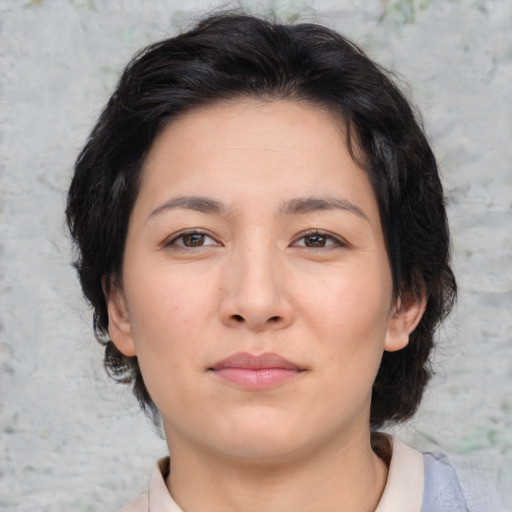 Neutral asian young-adult female with medium  brown hair and brown eyes
