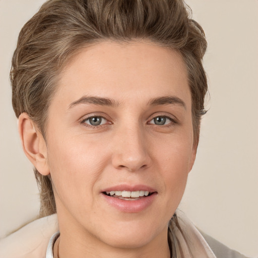 Joyful white young-adult female with medium  brown hair and grey eyes