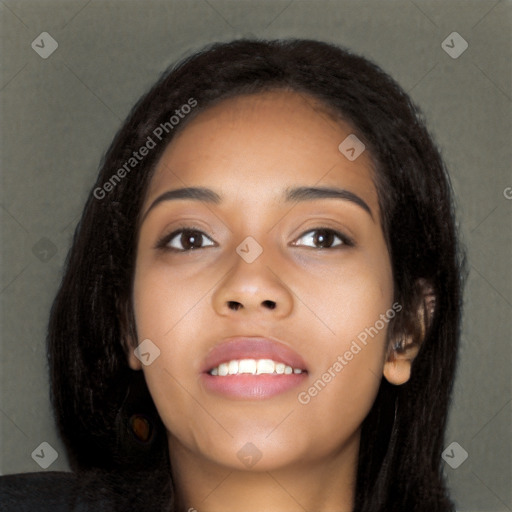 Joyful latino young-adult female with long  black hair and brown eyes