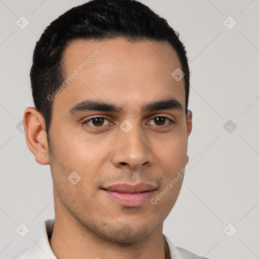 Joyful latino young-adult male with short  black hair and brown eyes