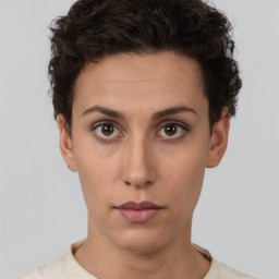 Neutral white young-adult female with short  brown hair and brown eyes