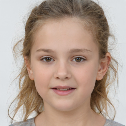 Joyful white child female with medium  brown hair and grey eyes