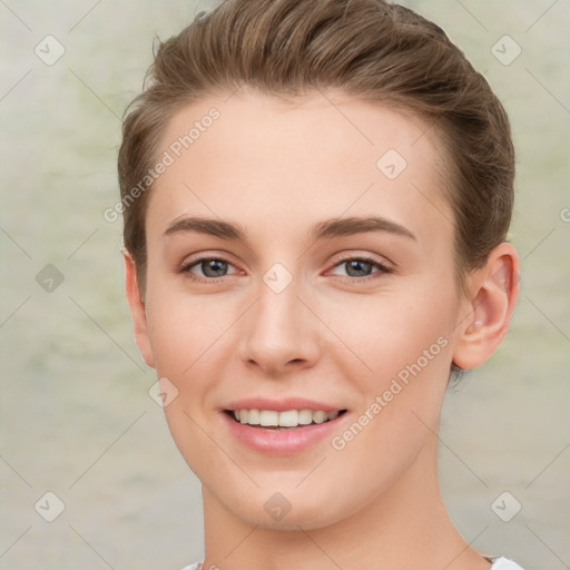 Joyful white young-adult female with short  brown hair and grey eyes