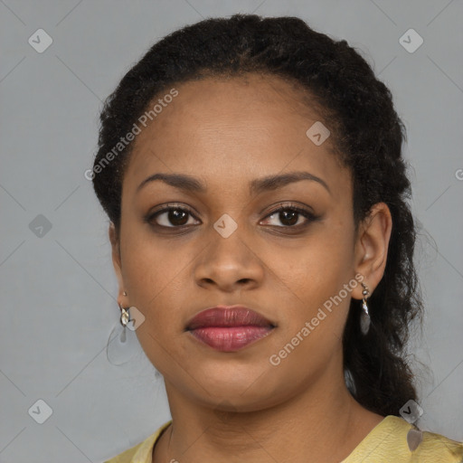 Neutral black young-adult female with medium  brown hair and brown eyes