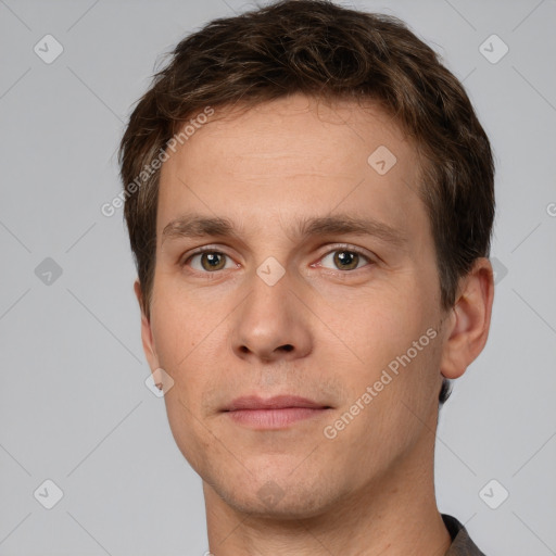 Neutral white young-adult male with short  brown hair and grey eyes