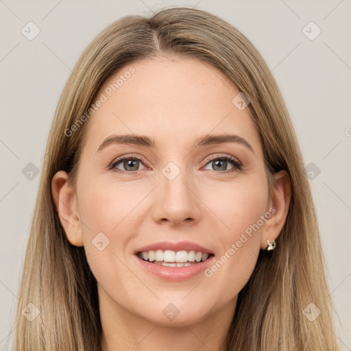 Joyful white young-adult female with long  brown hair and grey eyes