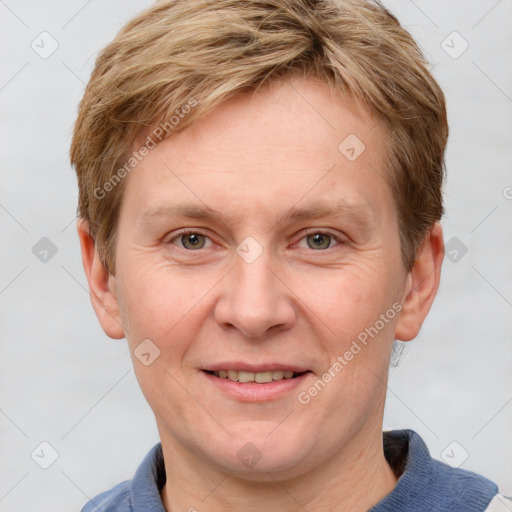 Joyful white adult male with short  brown hair and grey eyes