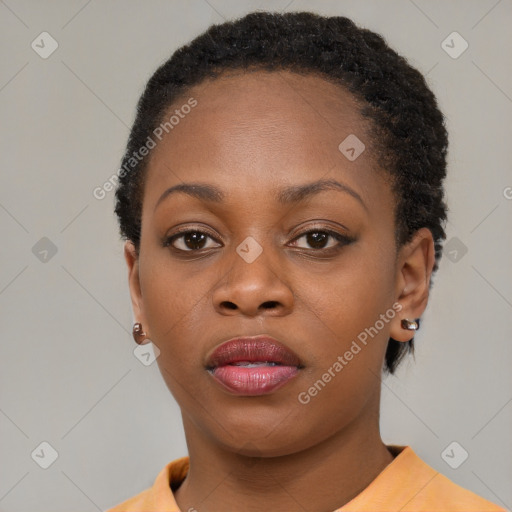 Neutral black young-adult female with short  brown hair and brown eyes