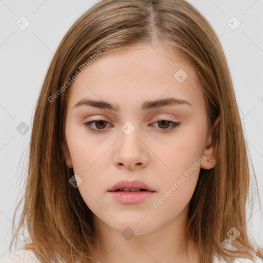 Neutral white young-adult female with long  brown hair and brown eyes