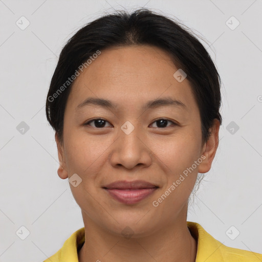 Joyful asian young-adult female with short  brown hair and brown eyes