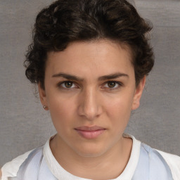 Neutral white young-adult female with short  brown hair and brown eyes