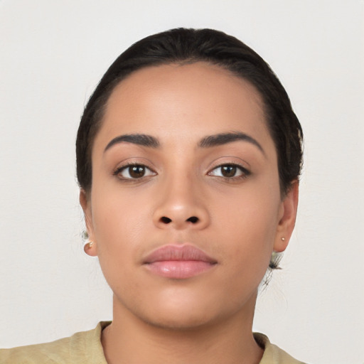 Neutral latino young-adult female with short  black hair and brown eyes