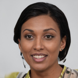 Joyful asian young-adult female with medium  black hair and brown eyes