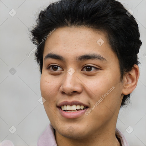 Joyful latino young-adult male with short  brown hair and brown eyes