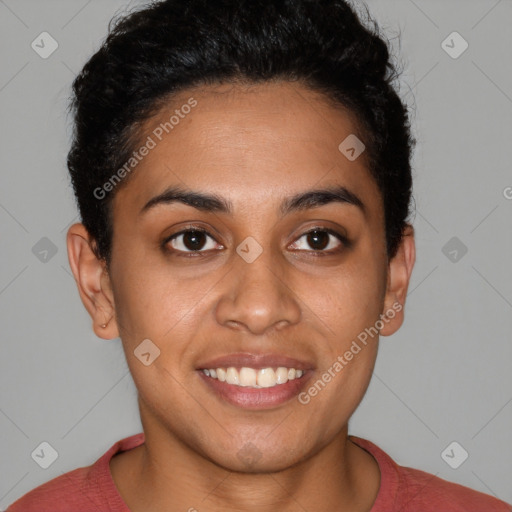 Joyful latino young-adult female with short  brown hair and brown eyes