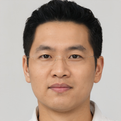 Neutral asian young-adult male with short  black hair and brown eyes