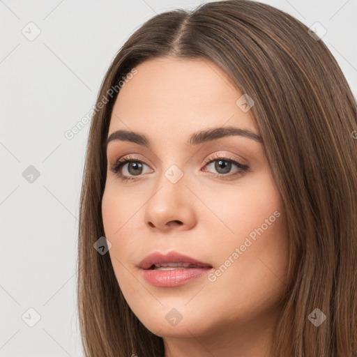 Neutral white young-adult female with long  brown hair and brown eyes