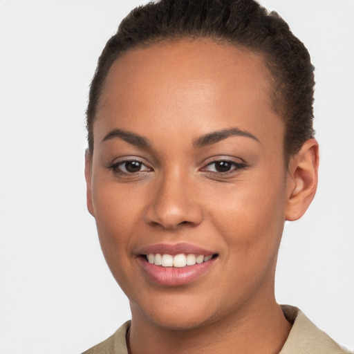 Joyful white young-adult female with short  brown hair and brown eyes