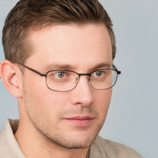 Neutral white young-adult male with short  brown hair and grey eyes