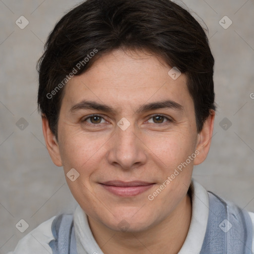 Joyful white adult female with short  brown hair and brown eyes