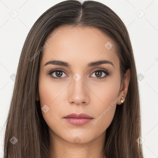 Neutral white young-adult female with long  brown hair and brown eyes