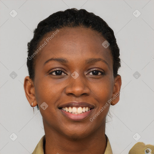 Joyful black young-adult female with short  brown hair and brown eyes