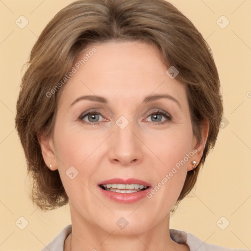 Joyful white adult female with medium  brown hair and brown eyes