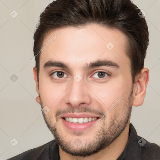 Joyful white young-adult male with short  brown hair and brown eyes