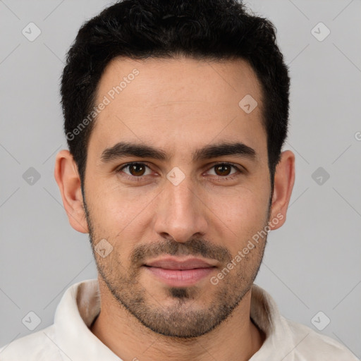 Joyful white young-adult male with short  brown hair and brown eyes