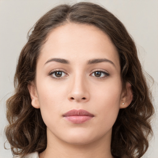 Neutral white young-adult female with medium  brown hair and brown eyes