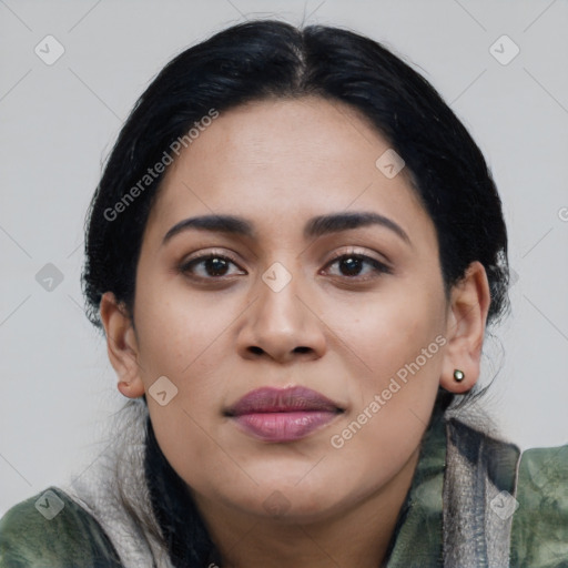 Joyful latino young-adult female with medium  black hair and brown eyes