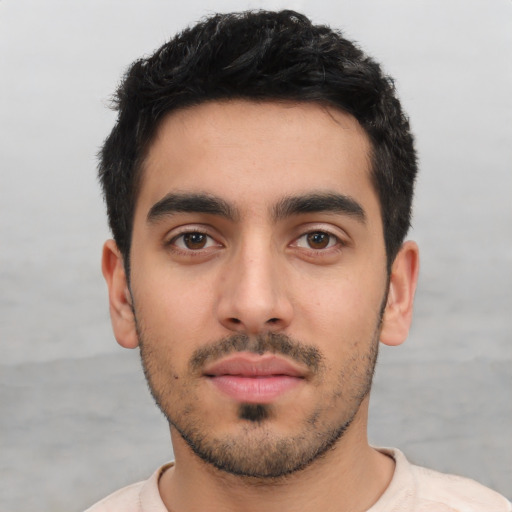 Neutral white young-adult male with short  black hair and brown eyes