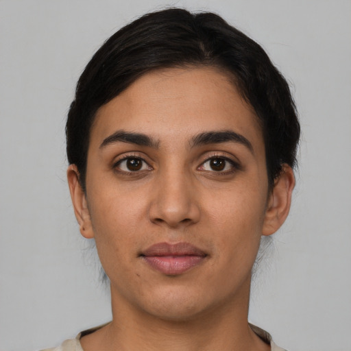 Neutral latino young-adult female with short  black hair and brown eyes