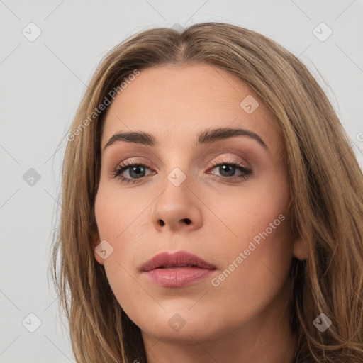 Neutral white young-adult female with long  brown hair and brown eyes