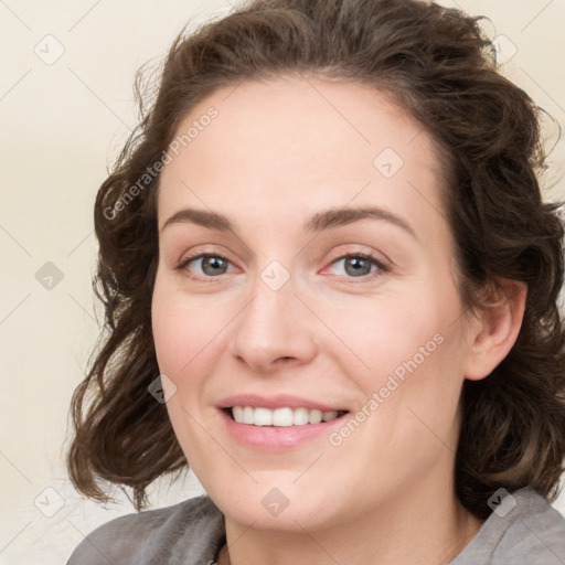 Joyful white young-adult female with medium  brown hair and green eyes