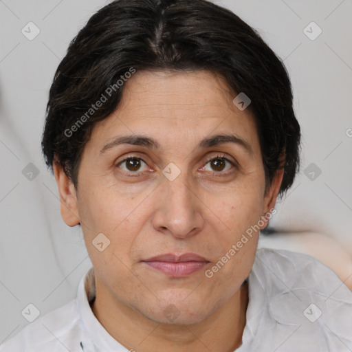 Joyful white adult female with short  brown hair and brown eyes