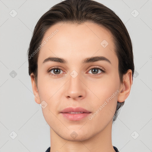 Neutral white young-adult female with short  brown hair and brown eyes