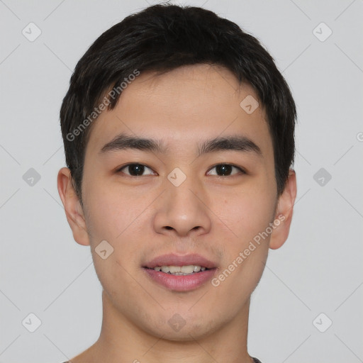 Joyful asian young-adult male with short  brown hair and brown eyes