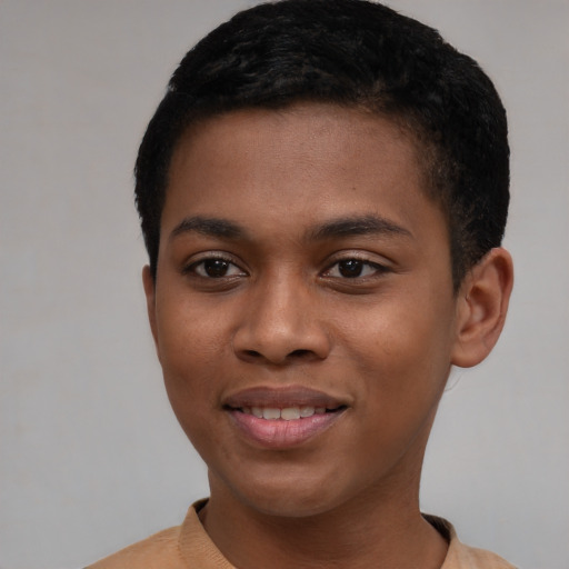 Joyful black young-adult male with short  brown hair and brown eyes