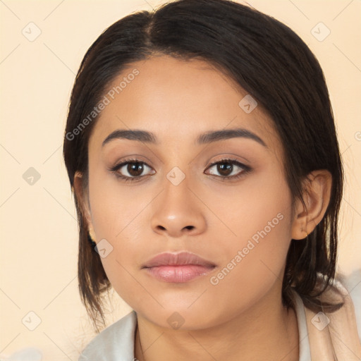 Neutral latino young-adult female with long  brown hair and brown eyes