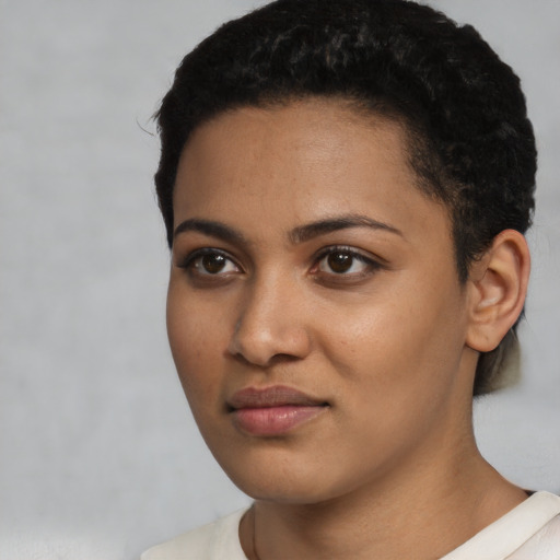 Neutral latino young-adult female with short  black hair and brown eyes