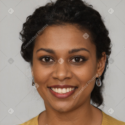 Joyful black young-adult female with long  brown hair and brown eyes