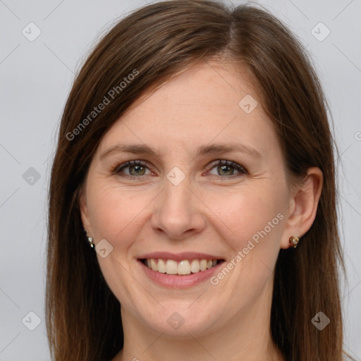 Joyful white young-adult female with long  brown hair and grey eyes