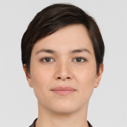 Neutral white young-adult female with short  brown hair and brown eyes