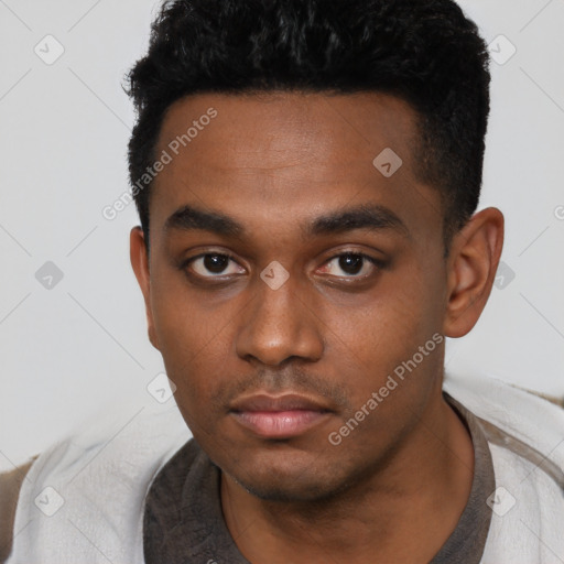 Neutral latino young-adult male with short  black hair and brown eyes