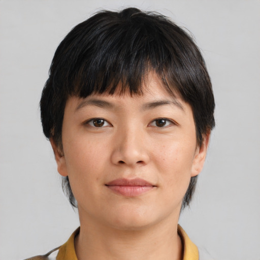 Neutral asian young-adult female with short  brown hair and brown eyes